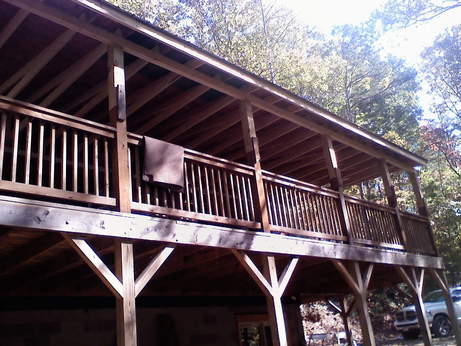 Timber framing under a new elevated porch and deck — Roof Leak Repair in Blodgett Mills by Roofing Brothers
